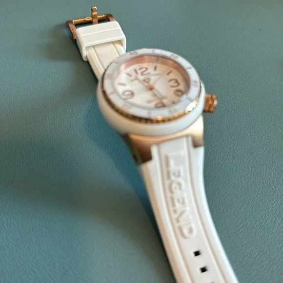 Swiss Legend, Neptune, white and rose gold watch. Has instruction manual.